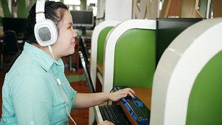 Visually impaired person using assistive technology