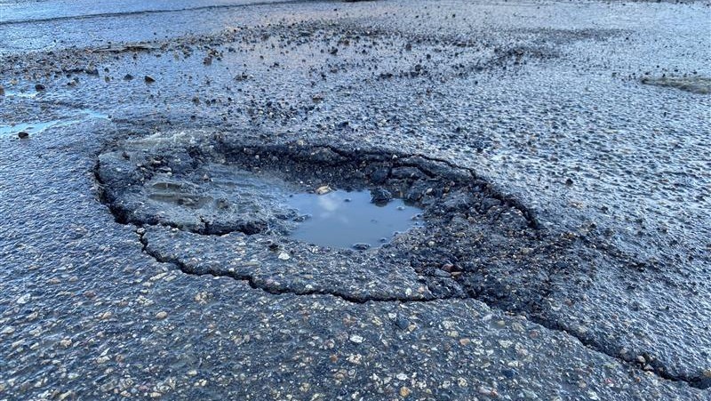 Image of a pothole on a street