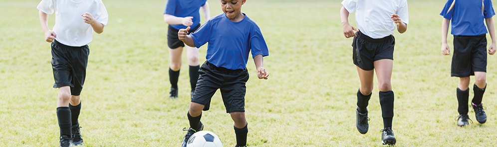 Kids playing soccer