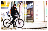 Photo of person biking in winter
