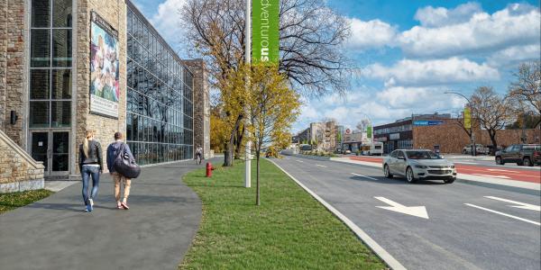 College Drive Link design showing widened walking path in front of St. Thomas Moore College looking East. Also shows dedicated transit lanes, 1 per direction, painted in red.