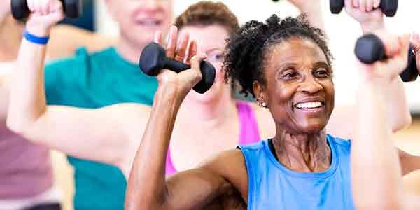 Image of a group of people exercising at a fitness centre