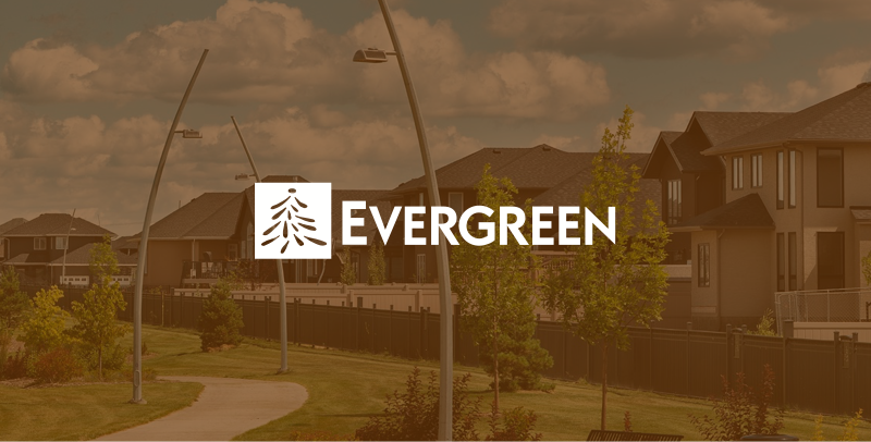 Evergreen text on a brown overlay over a photo of houses in the neighbourhood