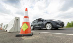 car passes a pylon